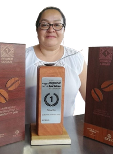 Dulce Barrera with her national cupping championship trophy